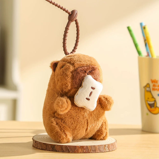 Cute Capybara Plush Keychain with Biscuit - Soft Cartoon Bag Charm Hover Image